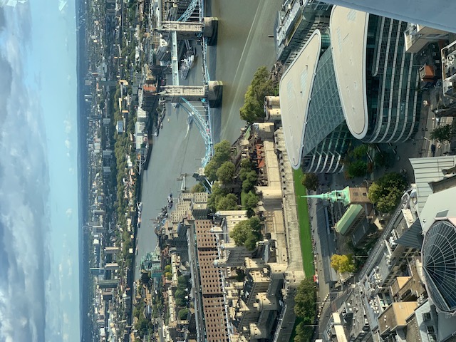 The Tower of London and Tower Bridge from above, with the Thames dividing the city in two.