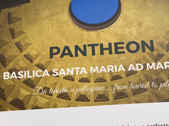 An information board with an image of the barrel vault and the oculus of the Pantheon.